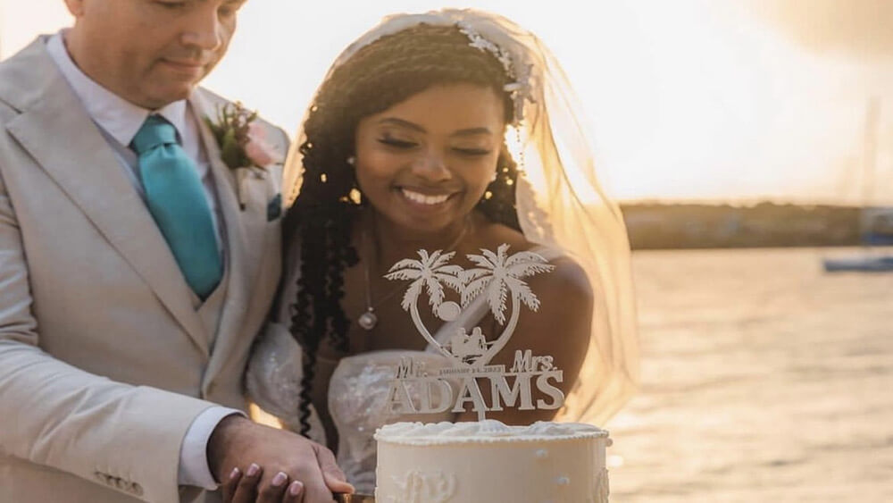 Newlyweds cutting cake